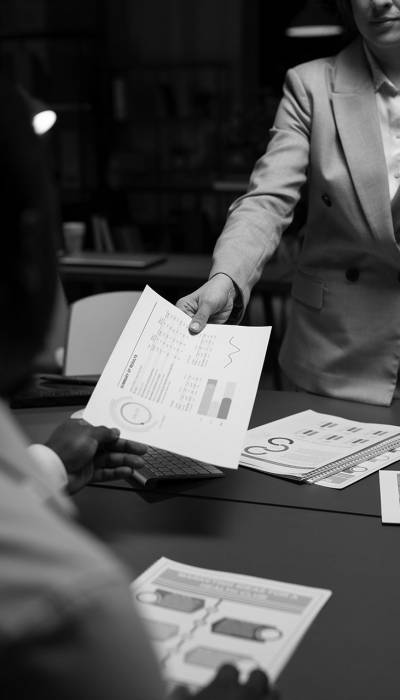 woman-giving-report-her-boss